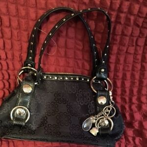 Elegant Black Handbag with Floral Design